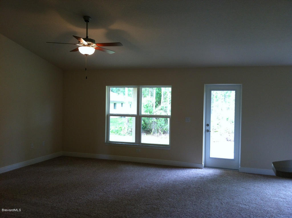 1064 San Rafael Road Southwest Palm Bay, FL 32908 - Photo 3 of 9 1755 Family room