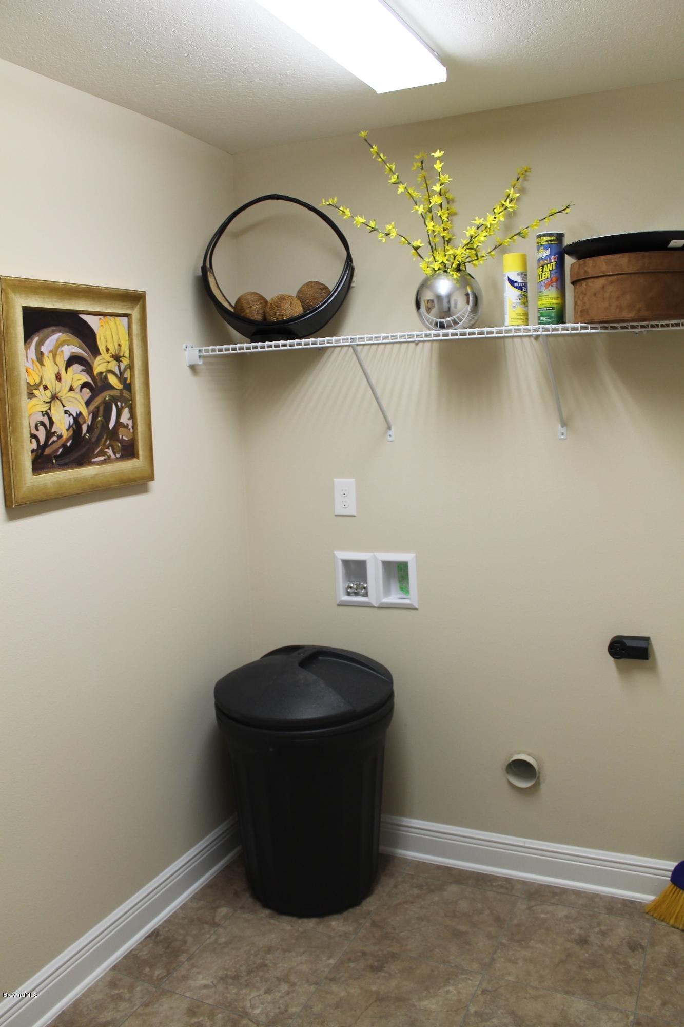 1064 San Rafael Road Southwest Palm Bay, FL 32908 - Photo 6 of 9 1755 laundry room (sample photo)