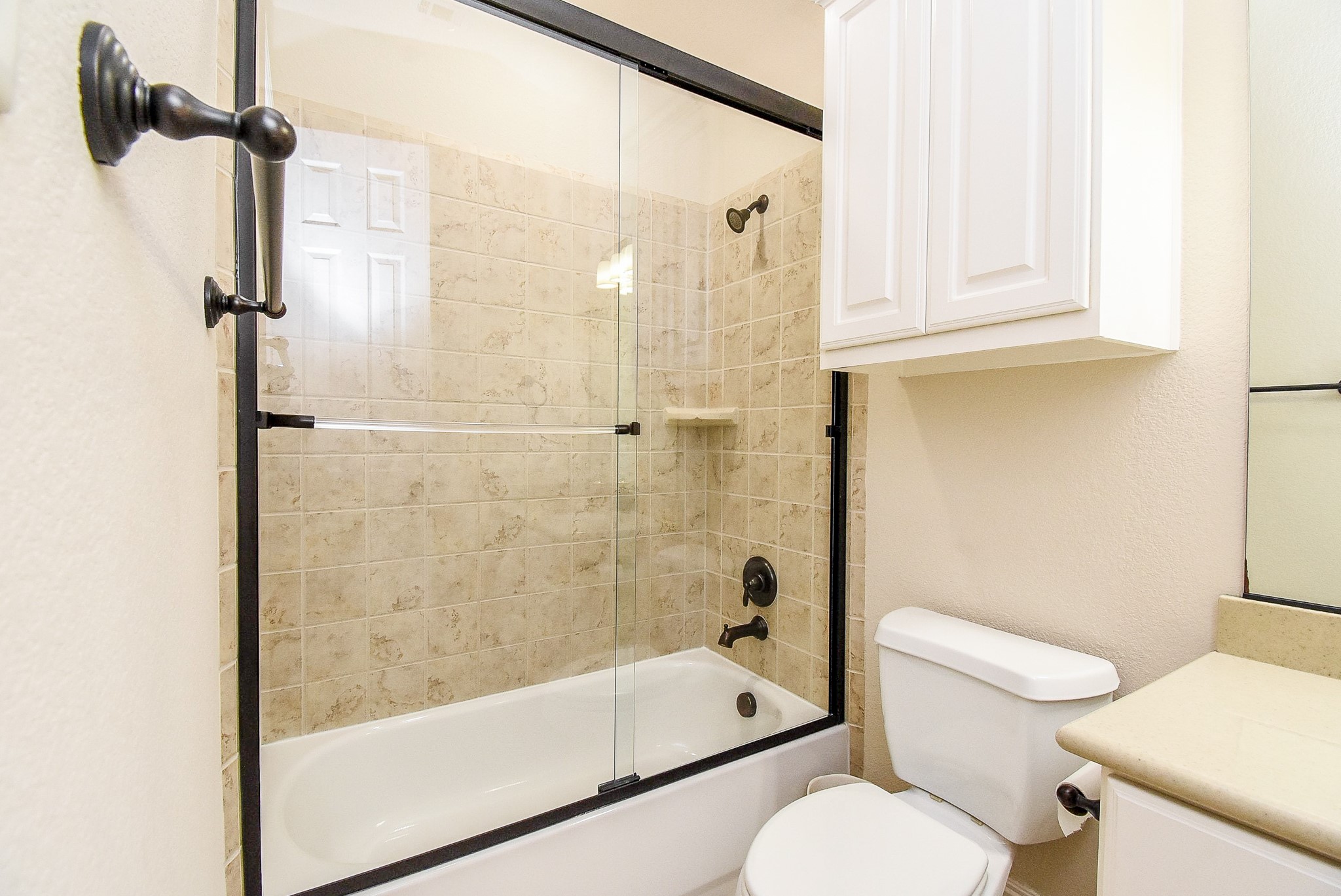 27427 Guthrie Ridge Lane Katy, TX 77494 - Photo 34 of 48 a bathroom with a toilet and a shower