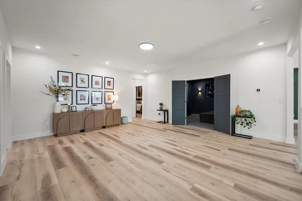 a view of a bedroom with a furniture