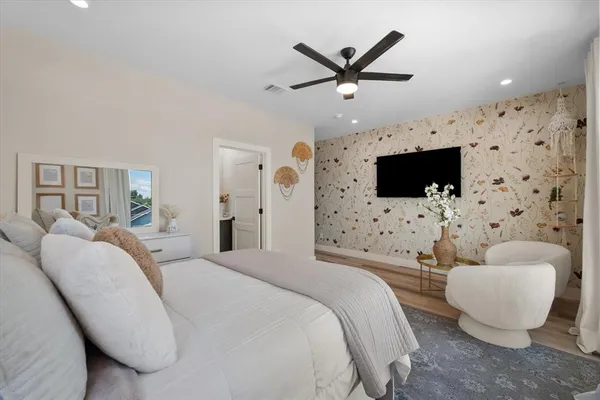 a living room with furniture fireplace and flat screen tv