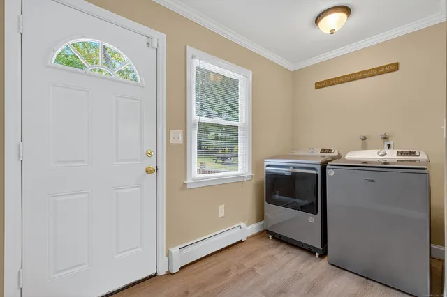 a kitchen with a stove and a window