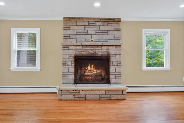 a living room with a fireplace