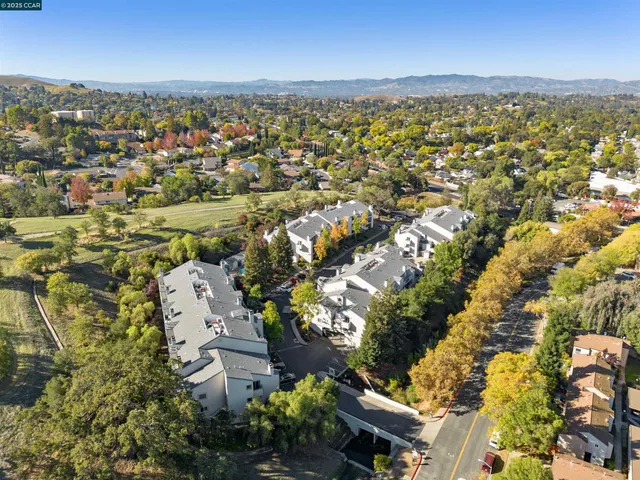 an aerial view of residential building with outdoor space