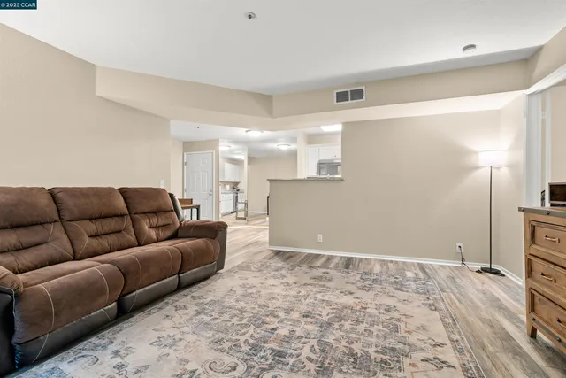 a living room with a couch and a couch