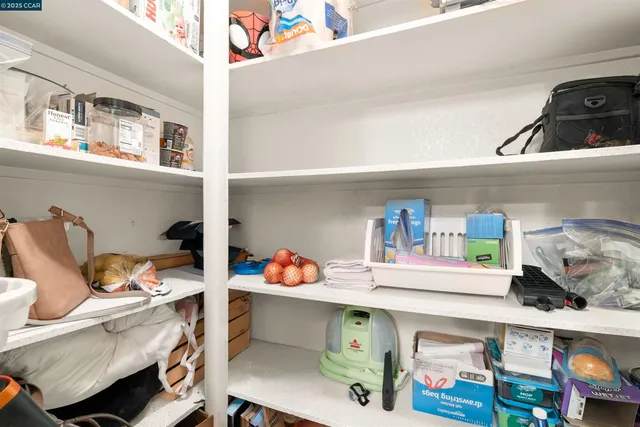 a bedroom with a bed and closet