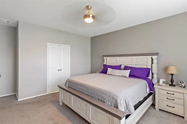 a bathroom with a double vanity sink a mirror and a shower