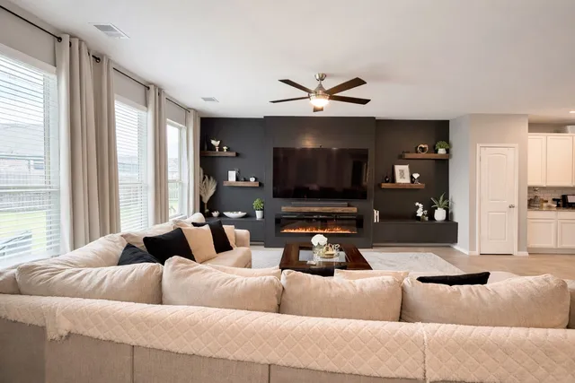 a hallway with table and flowerpot