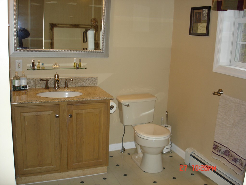 30 Bluefield Road Ashburnham, MA 01430 - Photo 18 of 30 a bathroom with a granite countertop toilet and a sink