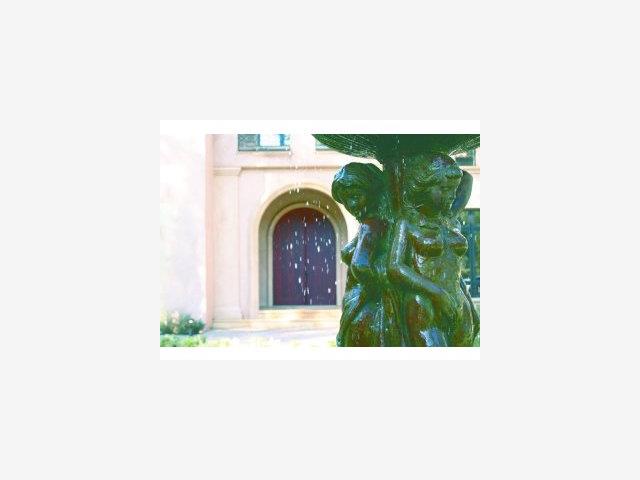 92 Atherton Avenue Atherton, CA 94027 - Photo 2 of 5 a living room with a couch and a fireplace