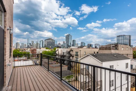 a view of city from a balcony