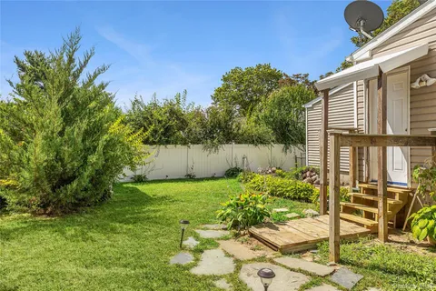 a view of a back yard of the house