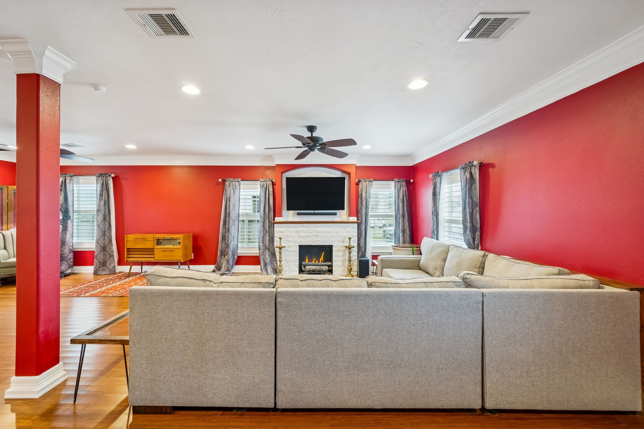 5309 Palmer Street Houston, TX 77004 - Photo 11 of 42 a living room with stainless steel appliances kitchen island granite countertop furniture and a large window
