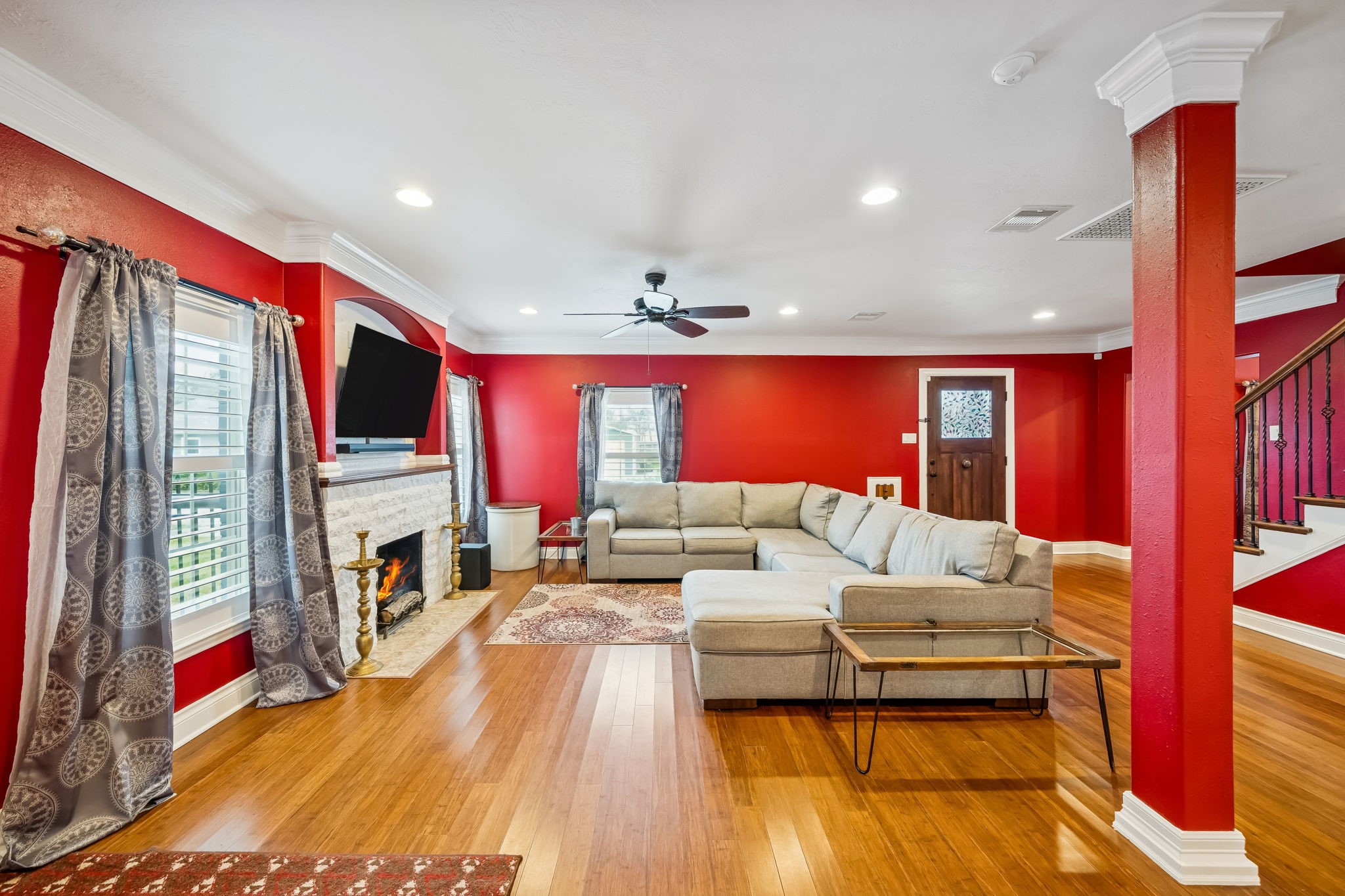 5309 Palmer Street Houston, TX 77004 - Photo 12 of 42 a living room with fireplace furniture and a flat screen tv
