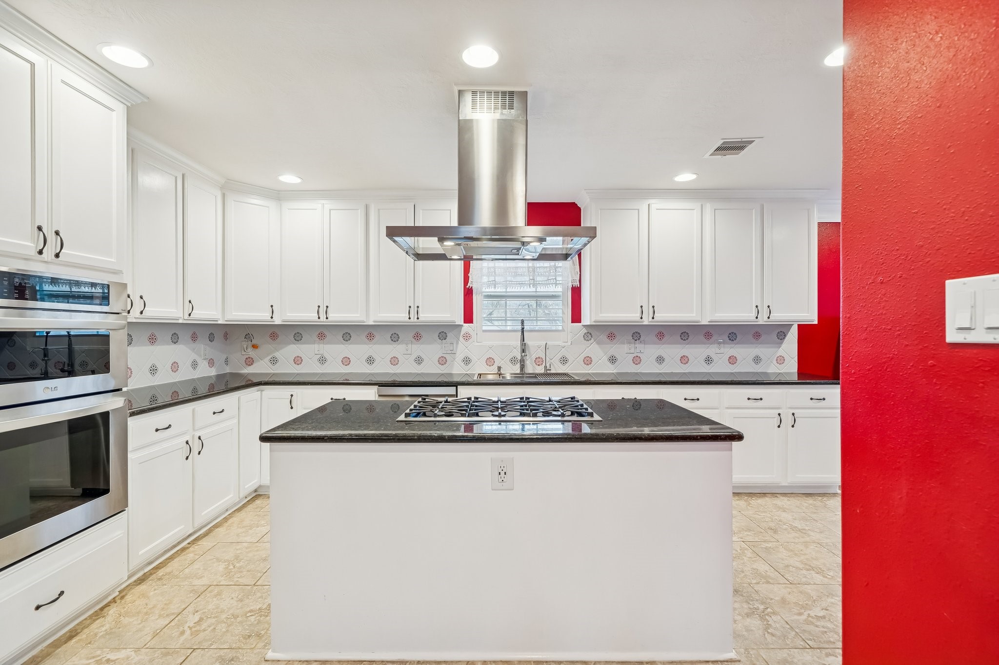 5309 Palmer Street Houston, TX 77004 - Photo 20 of 42 a kitchen with stainless steel appliances granite countertop a sink stove and cabinets