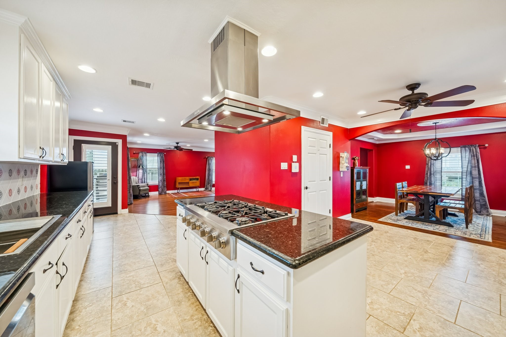 5309 Palmer Street Houston, TX 77004 - Photo 22 of 42 a kitchen with stainless steel appliances granite countertop a stove and a wooden cabinets