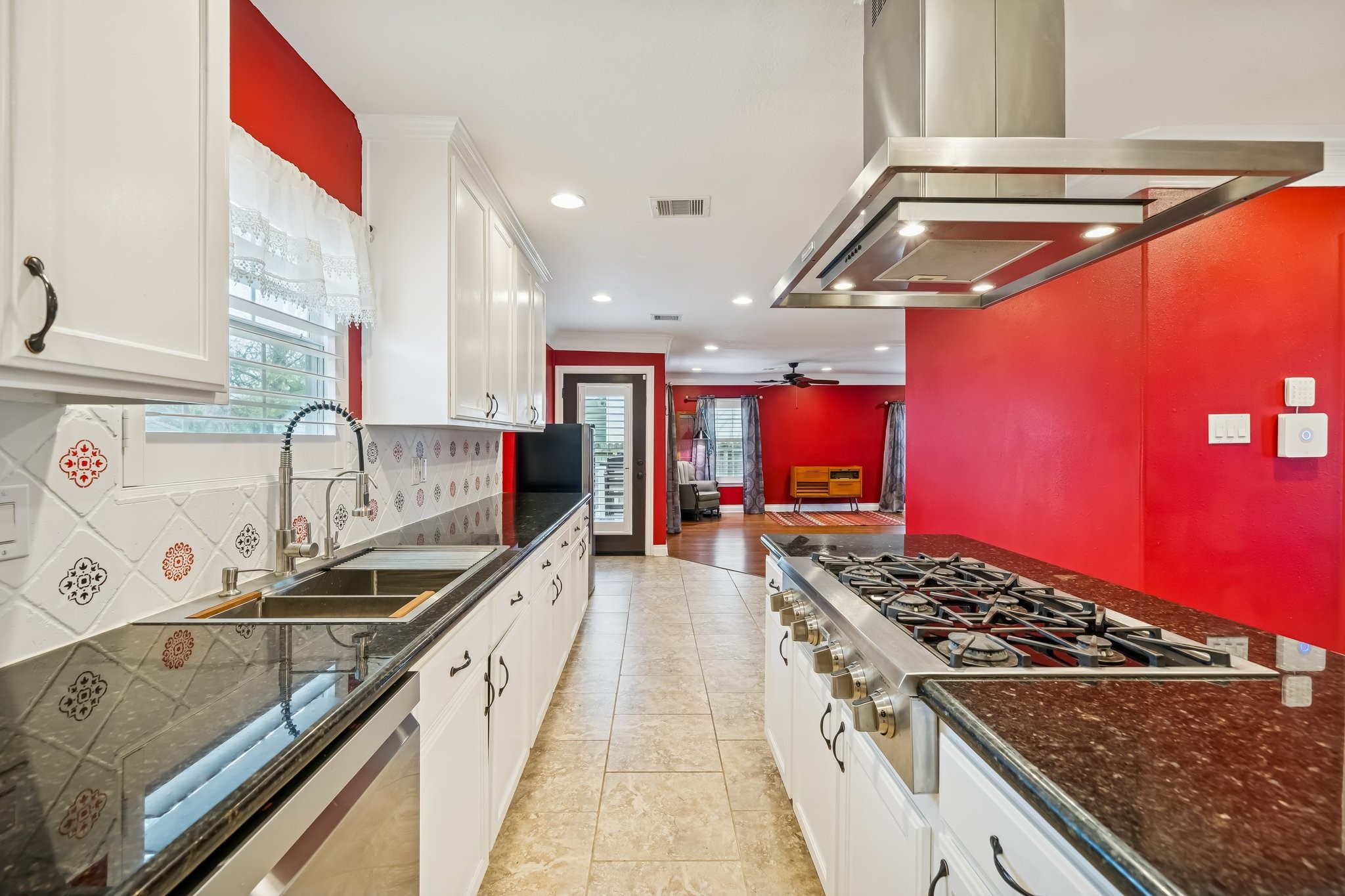 5309 Palmer Street Houston, TX 77004 - Photo 23 of 42 a kitchen with stainless steel appliances granite countertop a stove and a sink