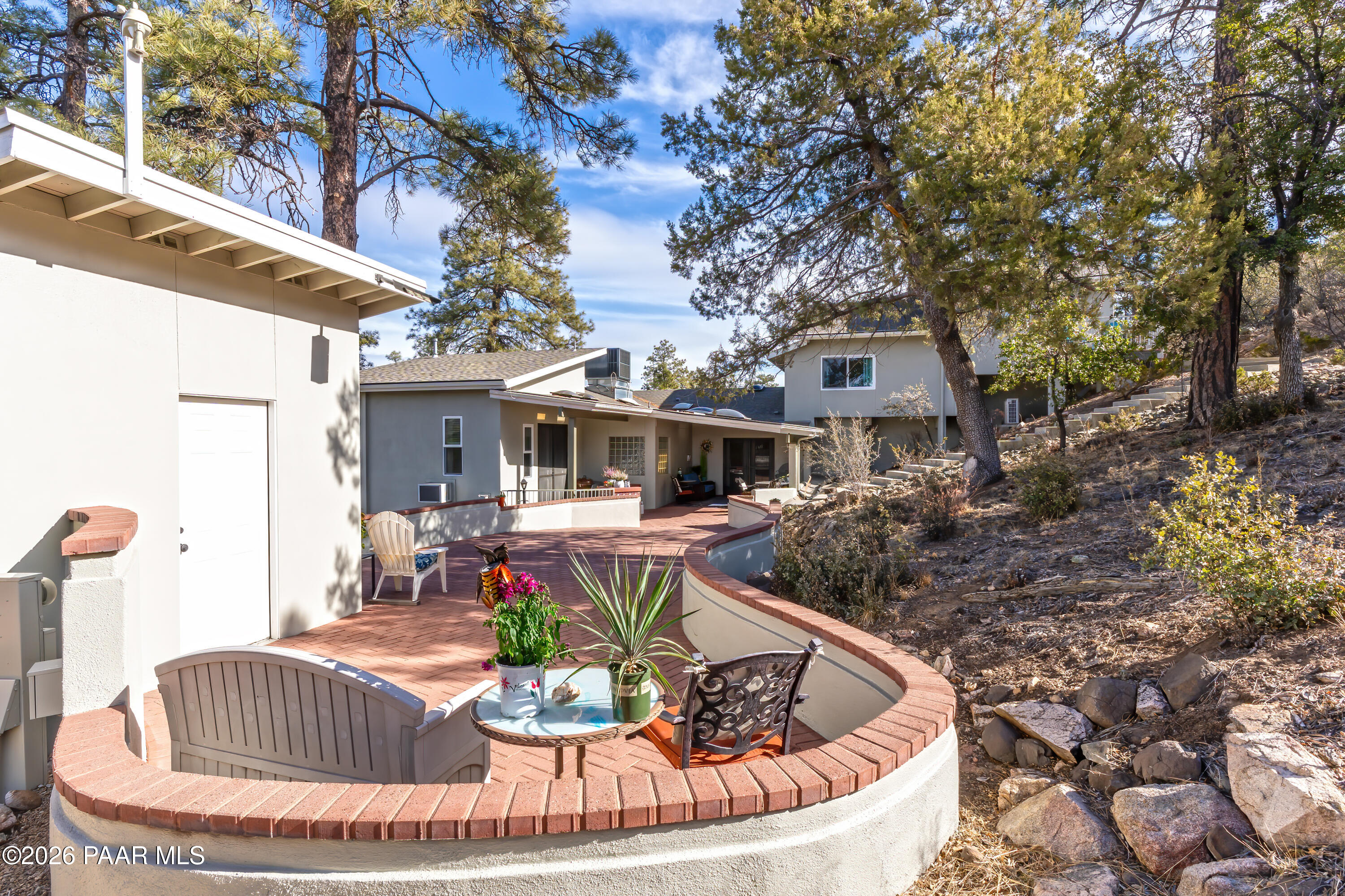 2405 North Williamson Valley Road Prescott, AZ 86305 - Photo 15 of 79 a view of a house with backyard fire pit and outdoor seating