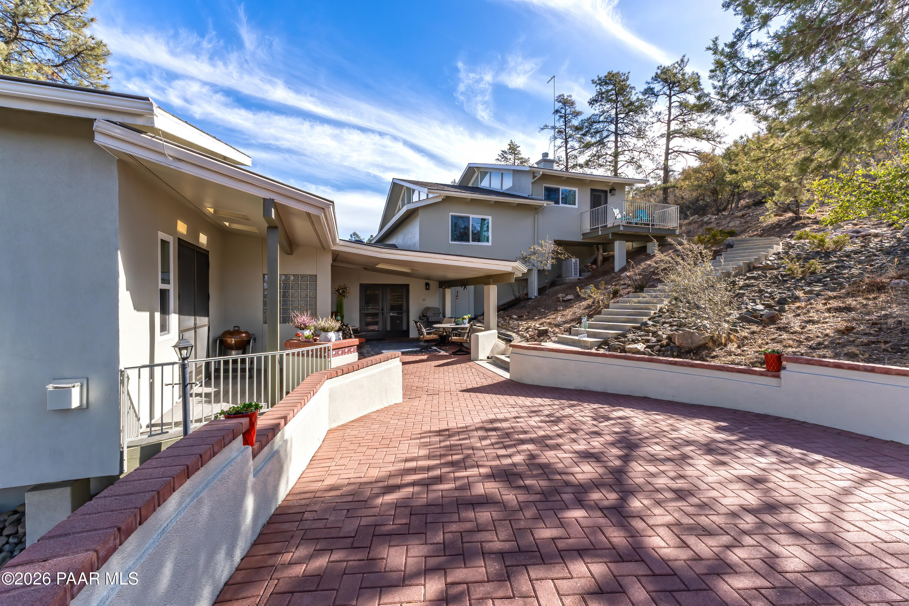 2405 North Williamson Valley Road Prescott, AZ 86305 - Photo 17 of 79 a view of a house with entrance gate and wooden floor