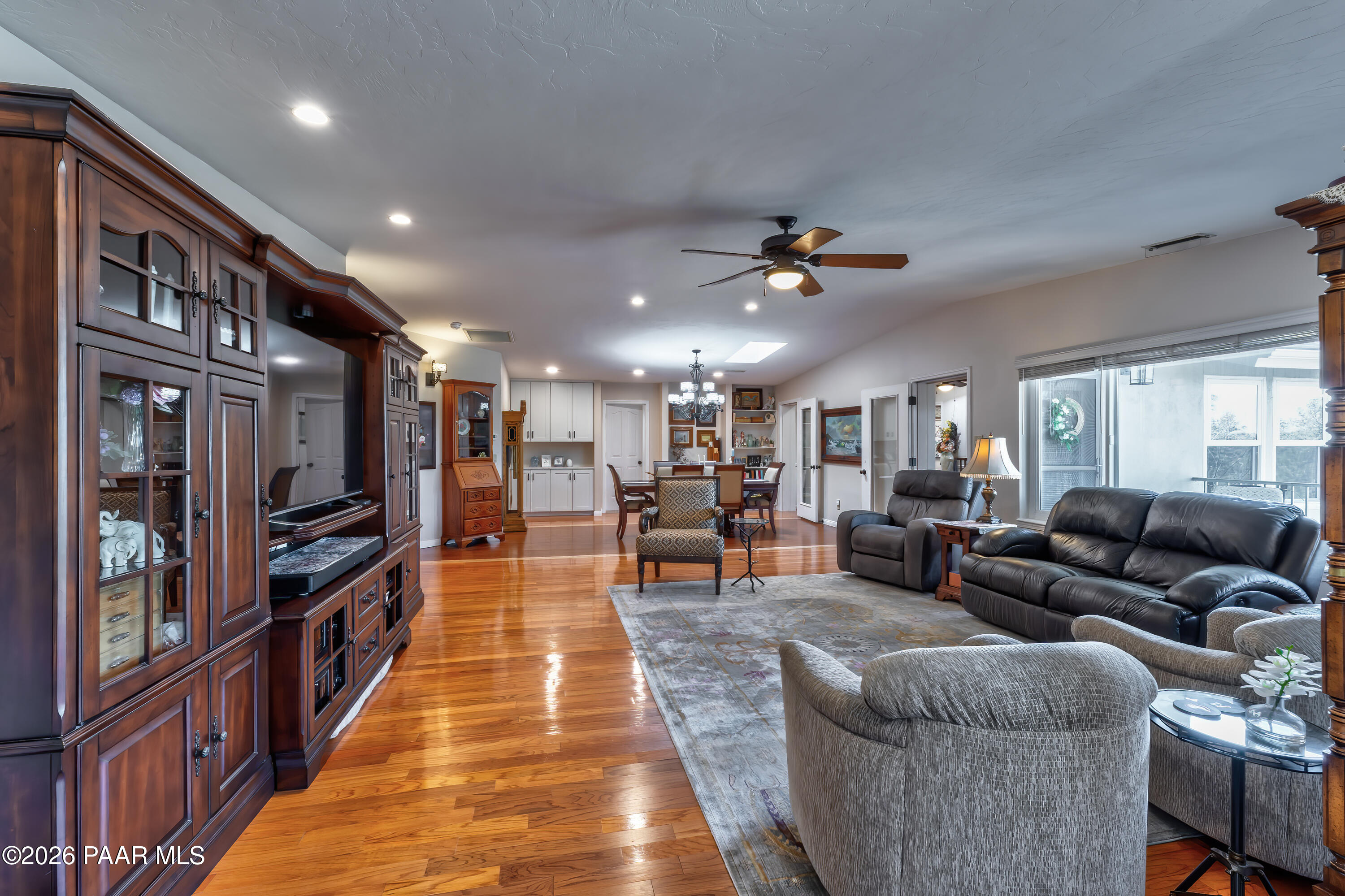2405 North Williamson Valley Road Prescott, AZ 86305 - Photo 20 of 79 a living room with furniture and a flat screen tv