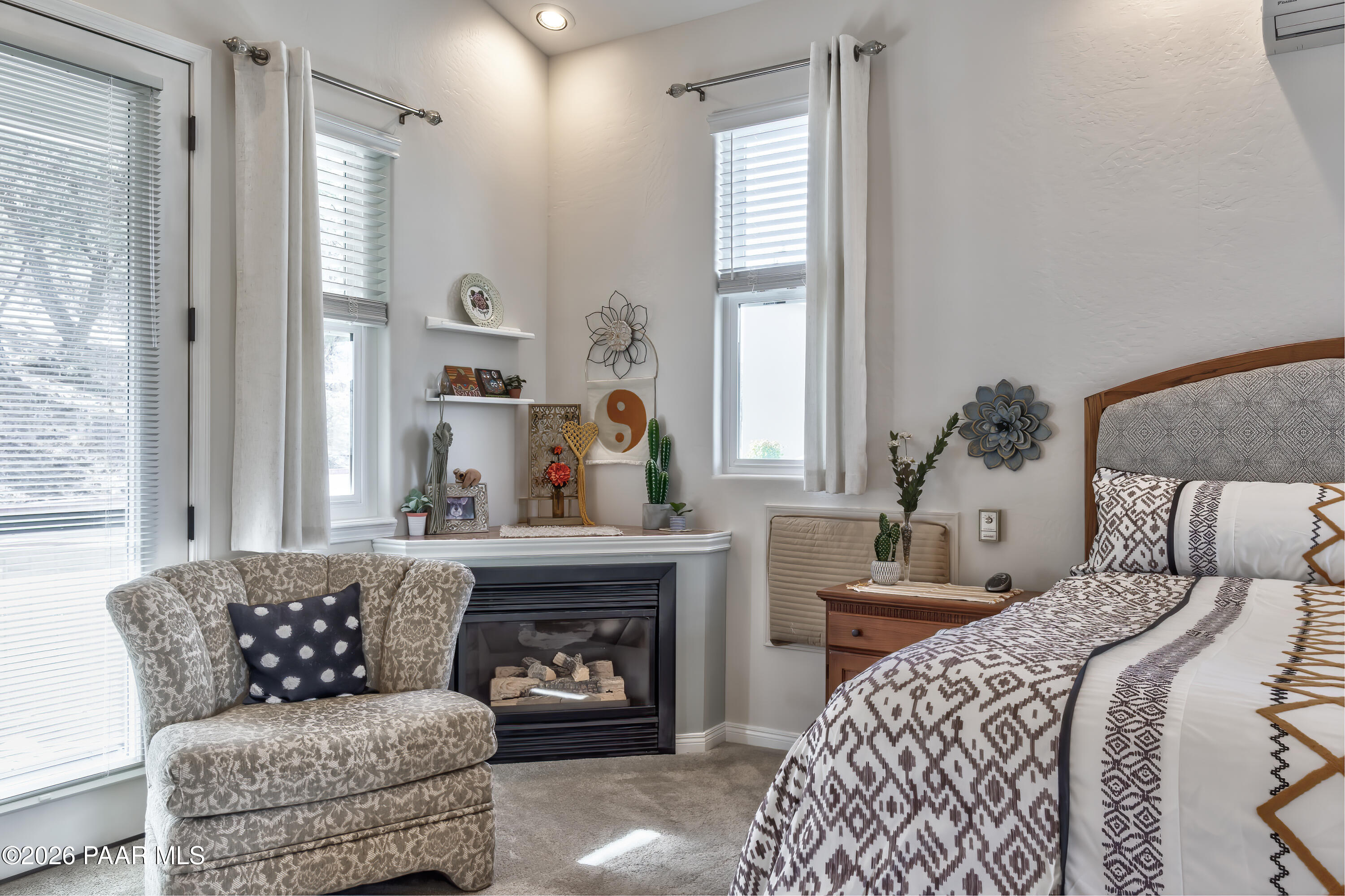 2405 North Williamson Valley Road Prescott, AZ 86305 - Photo 29 of 79 a living room with furniture and a fireplace