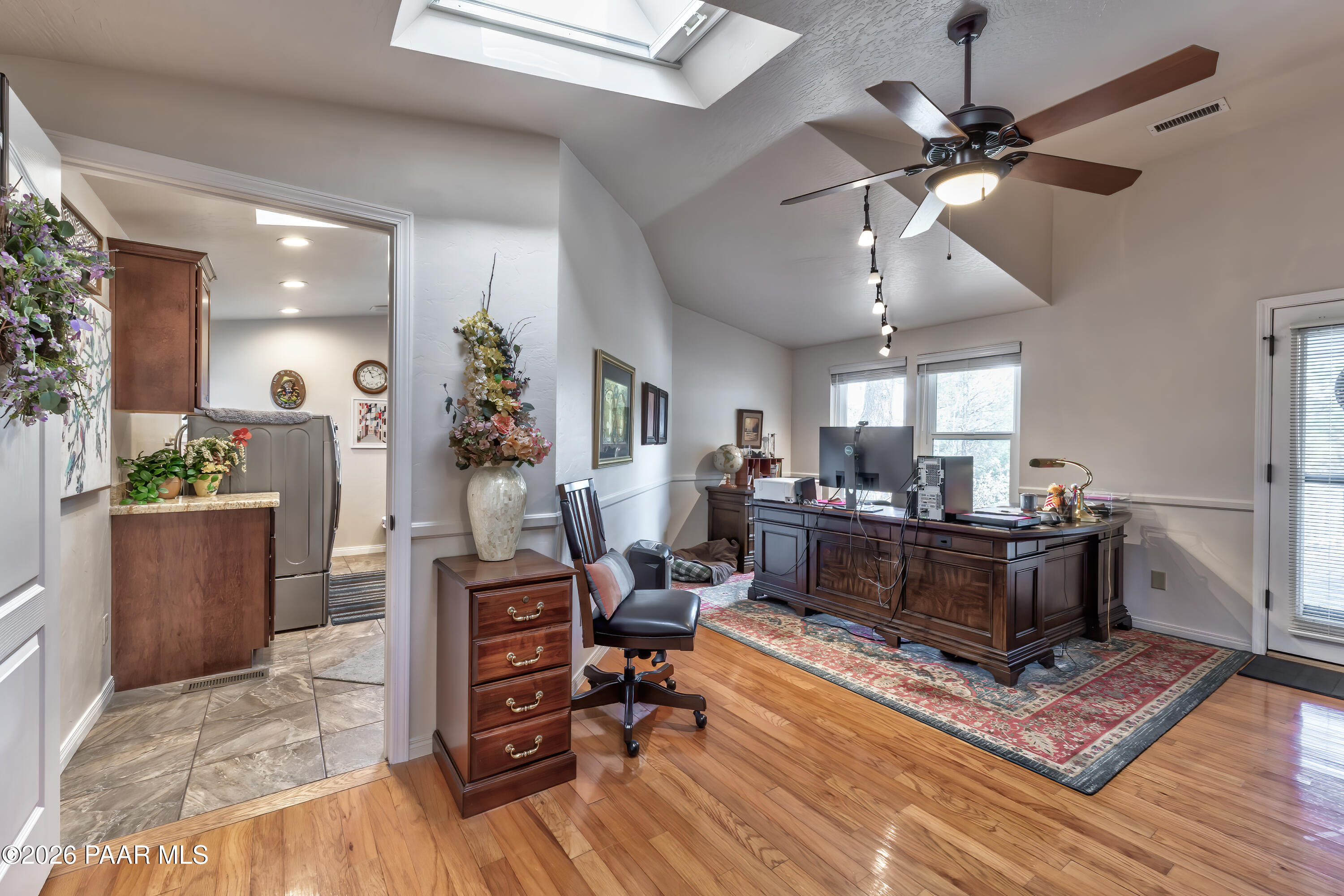 2405 North Williamson Valley Road Prescott, AZ 86305 - Photo 37 of 79 a living room with furniture and a wooden floor