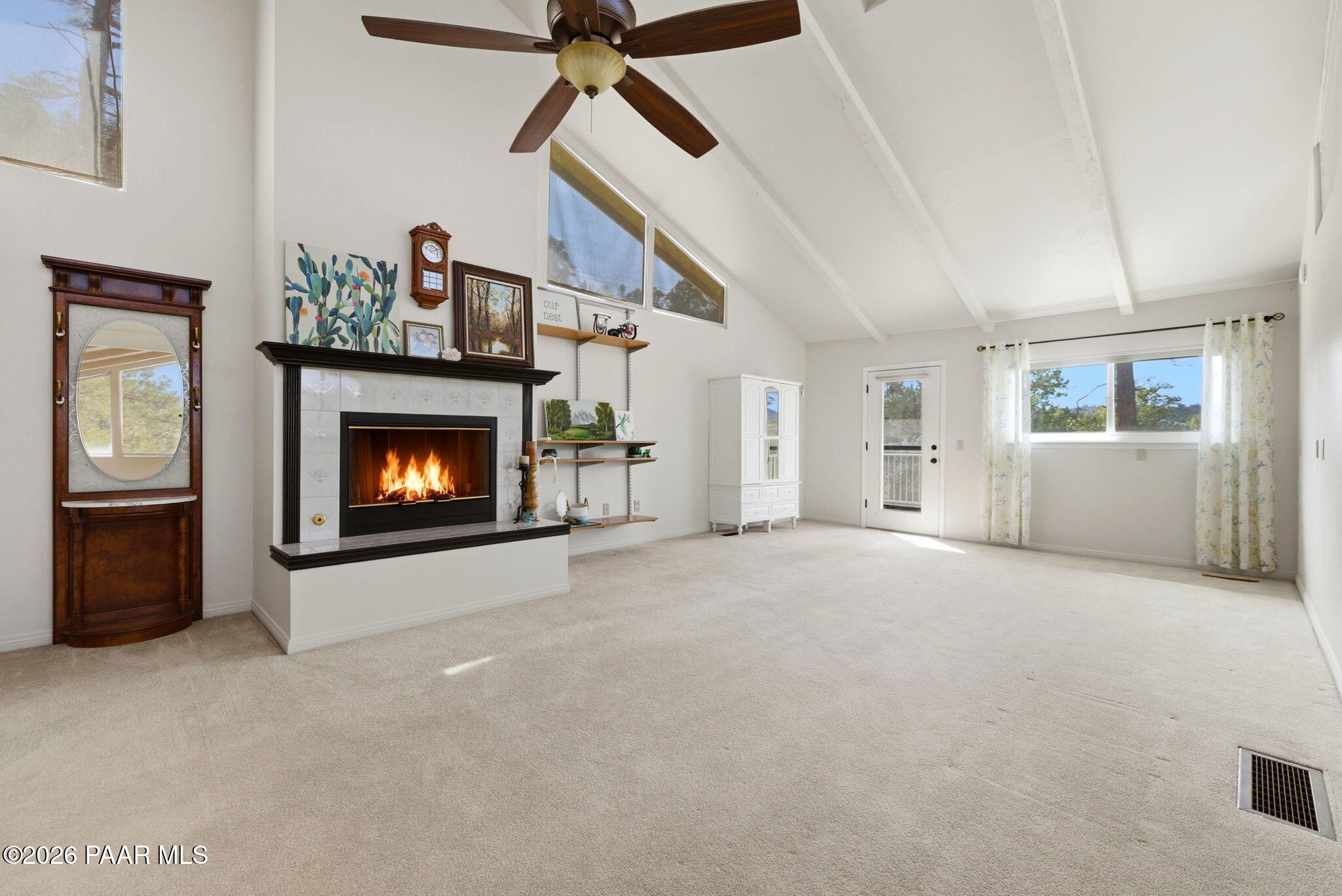 2405 North Williamson Valley Road Prescott, AZ 86305 - Photo 58 of 79 a living room with furniture and a fireplace