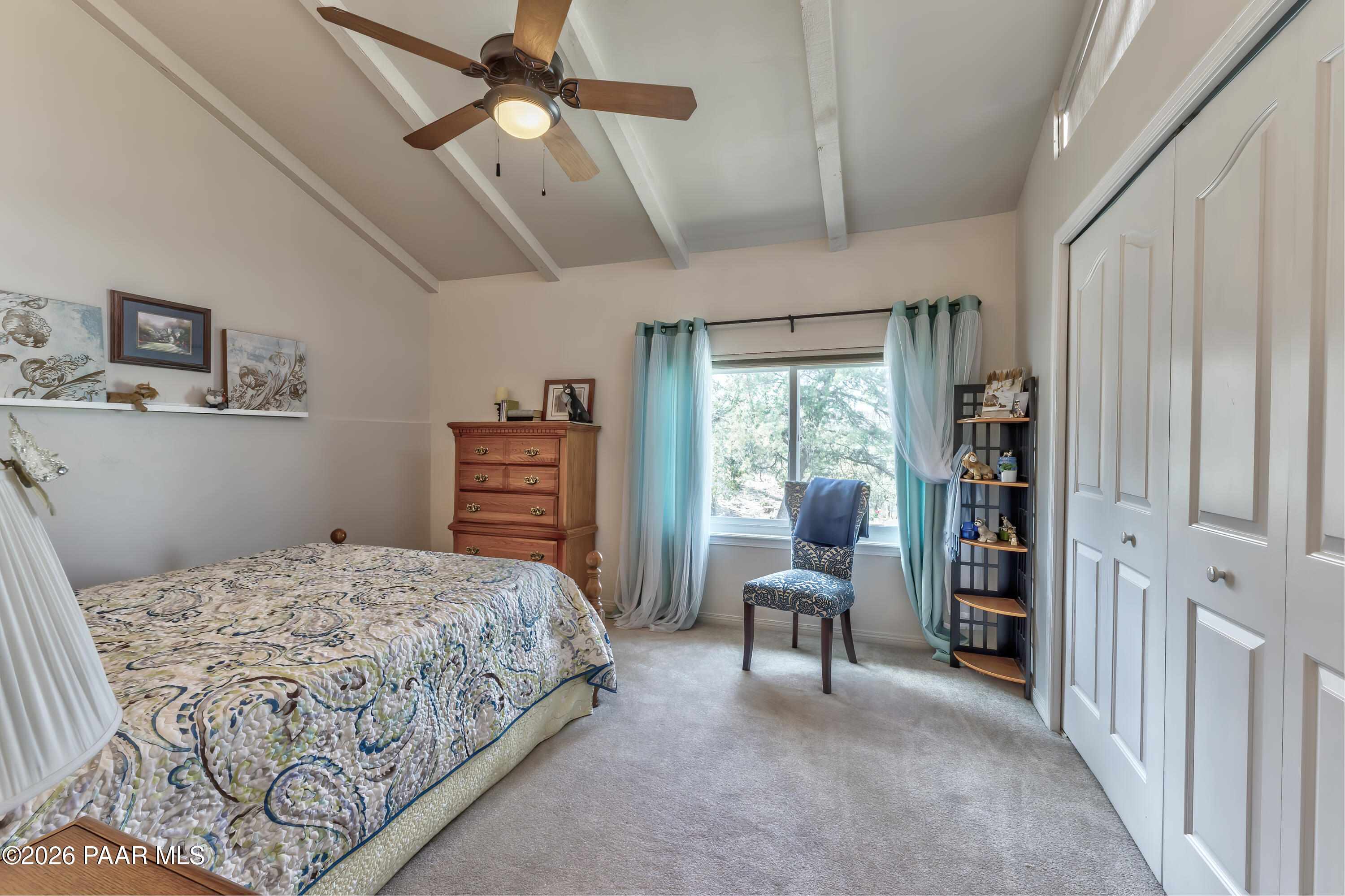 2405 North Williamson Valley Road Prescott, AZ 86305 - Photo 60 of 79 a bedroom with a large bed and a window