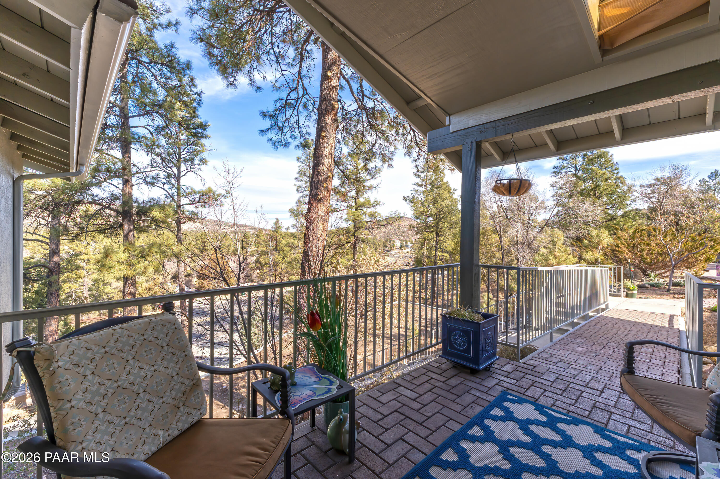 2405 North Williamson Valley Road Prescott, AZ 86305 - Photo 7 of 79 a view of a porch with furniture and wooden floor