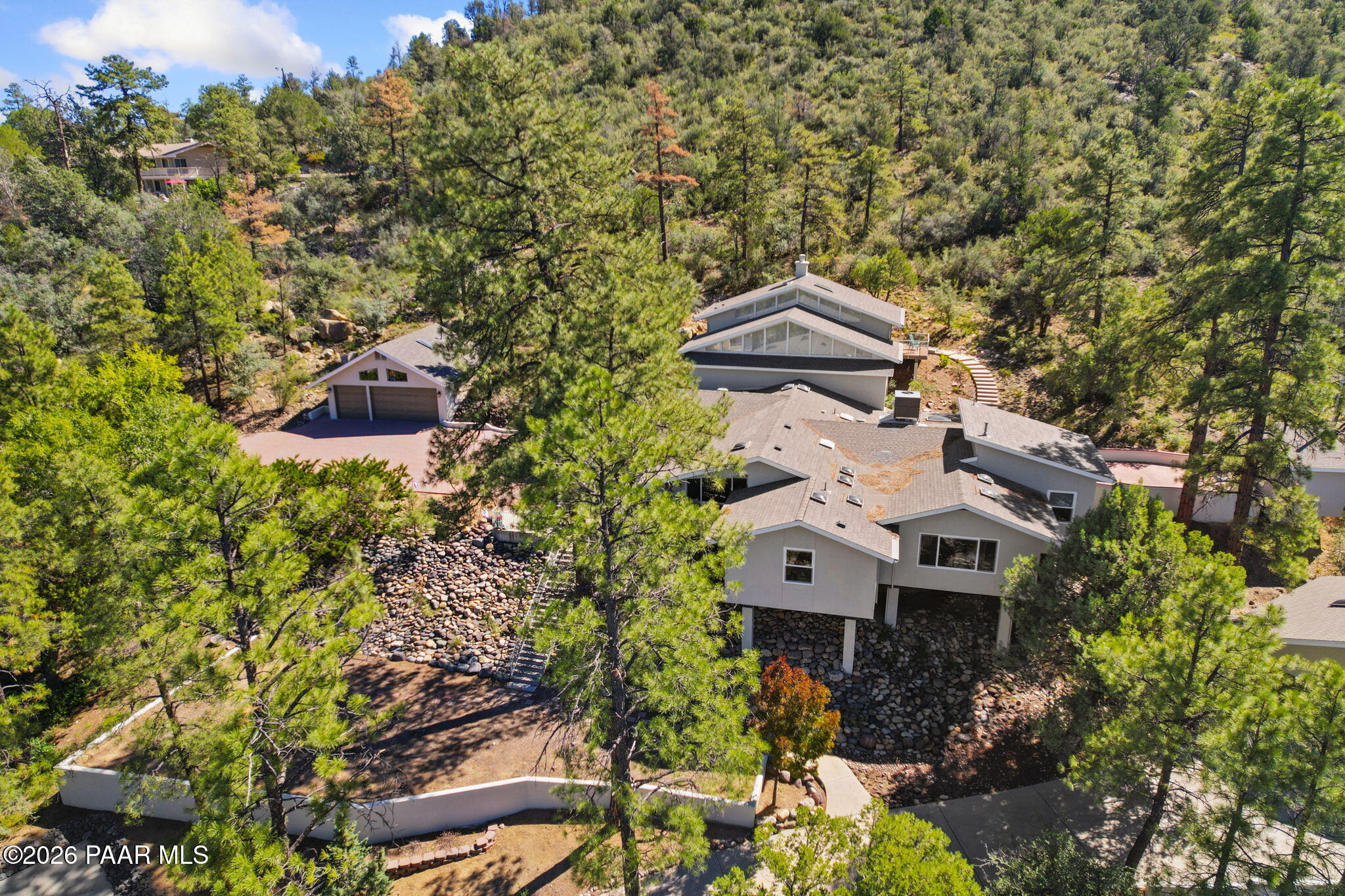 2405 North Williamson Valley Road Prescott, AZ 86305 - Photo 74 of 79 an aerial view of a house with a yard and trees