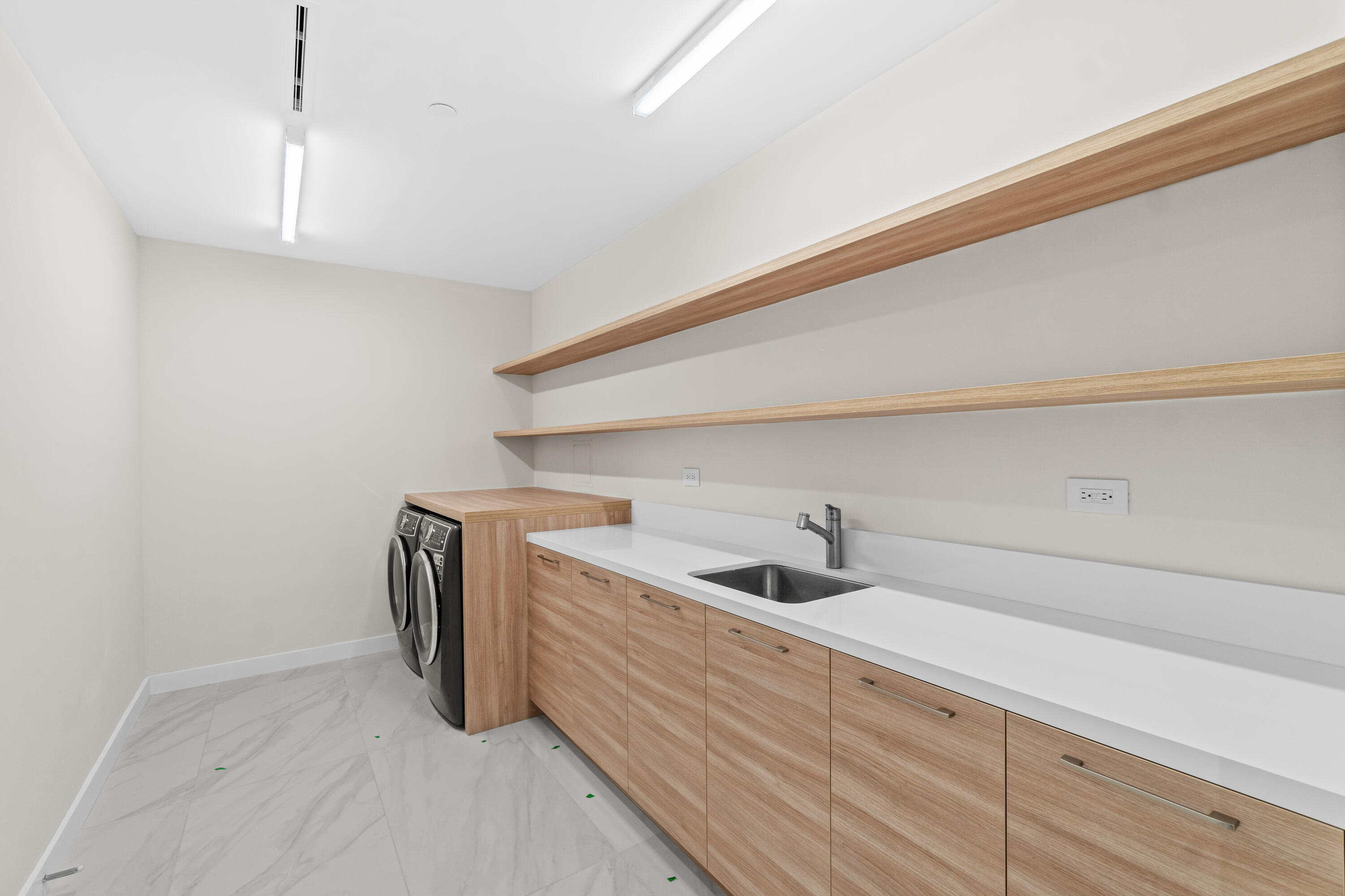 220 Southeast Mizner Boulevard, Unit 223 Boca Raton, FL 33432 - Photo 13 of 21 Large Laundry Room