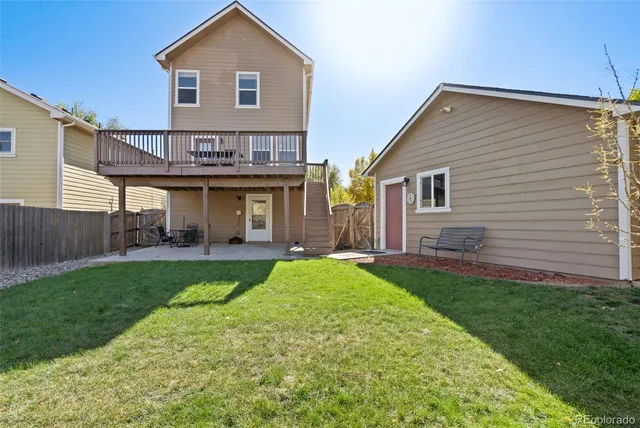 a front view of a house with a yard and porch