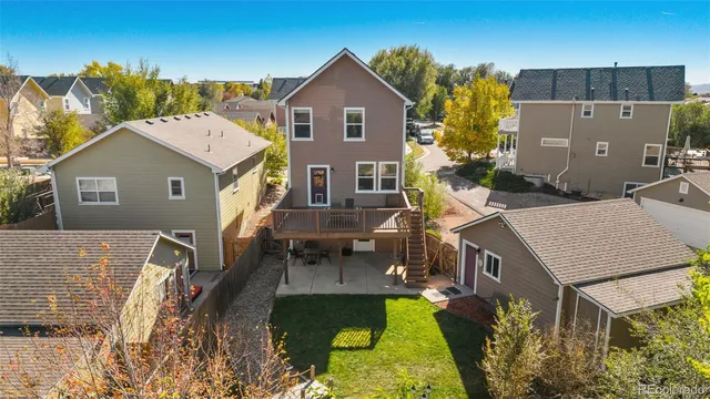a aerial view of a house with a yard