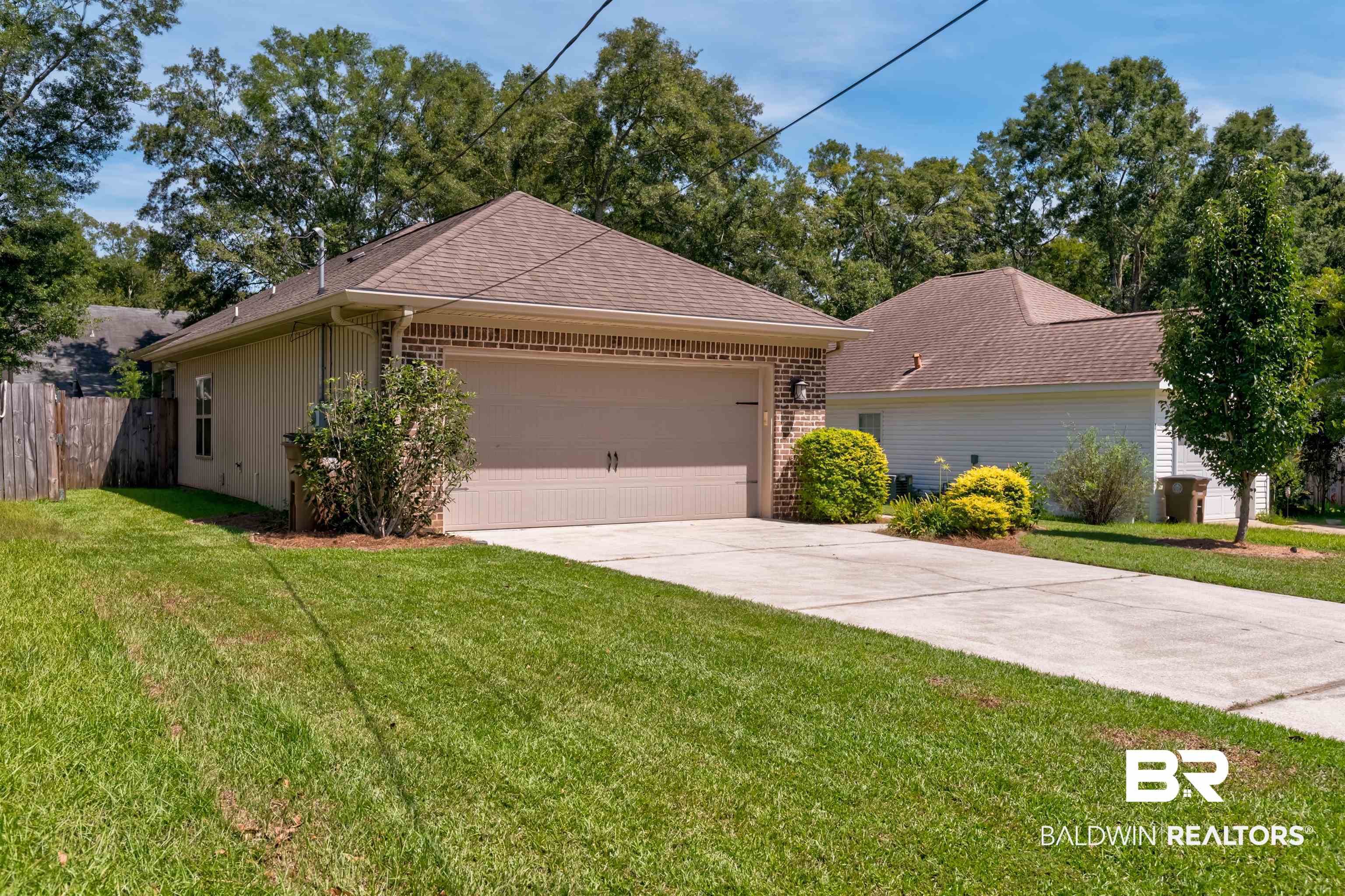965 Henckley Avenue Mobile, AL 36609 - Photo 2 of 30 Single story home featuring a front yard and a garage