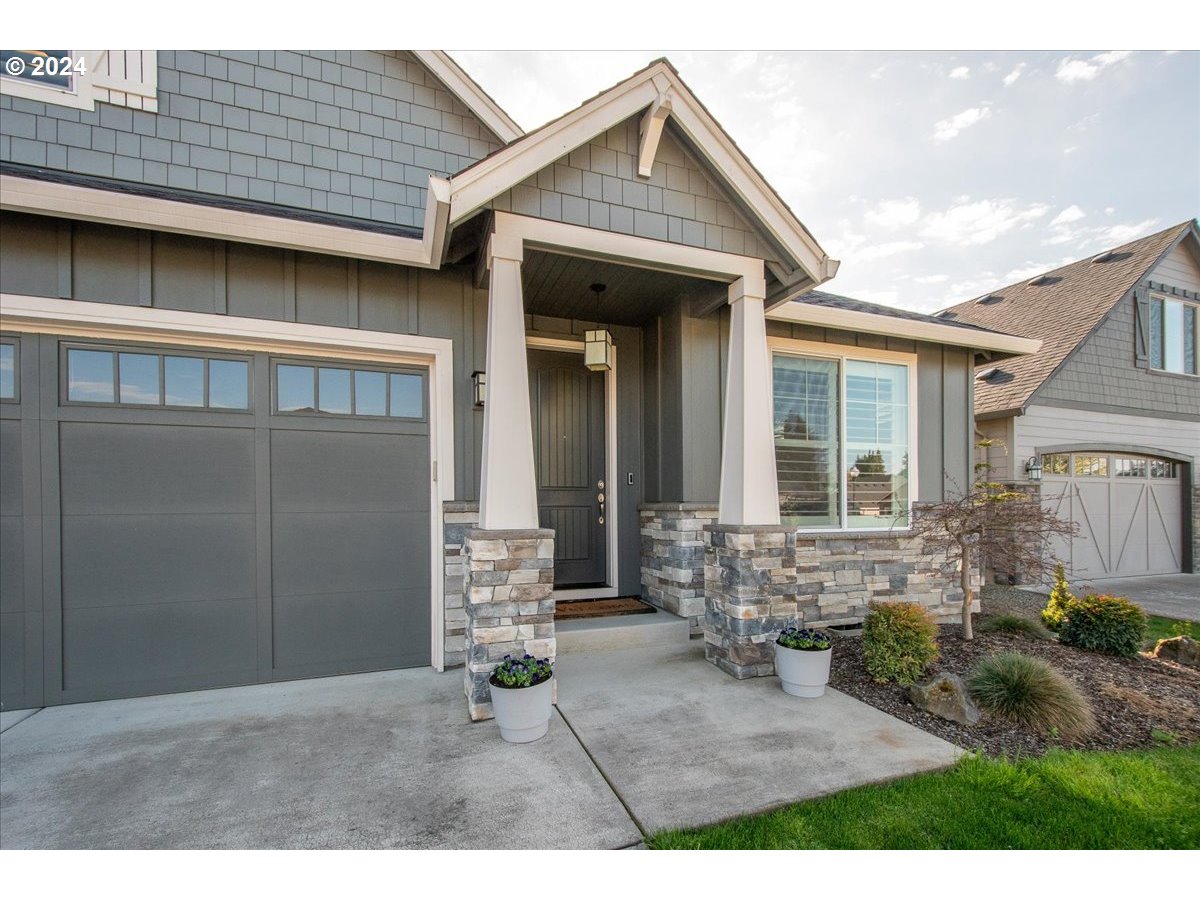 756 North 47th Avenue Ridgefield, WA 98642 - Photo 2 of 42 a backyard of a house with outdoor seating