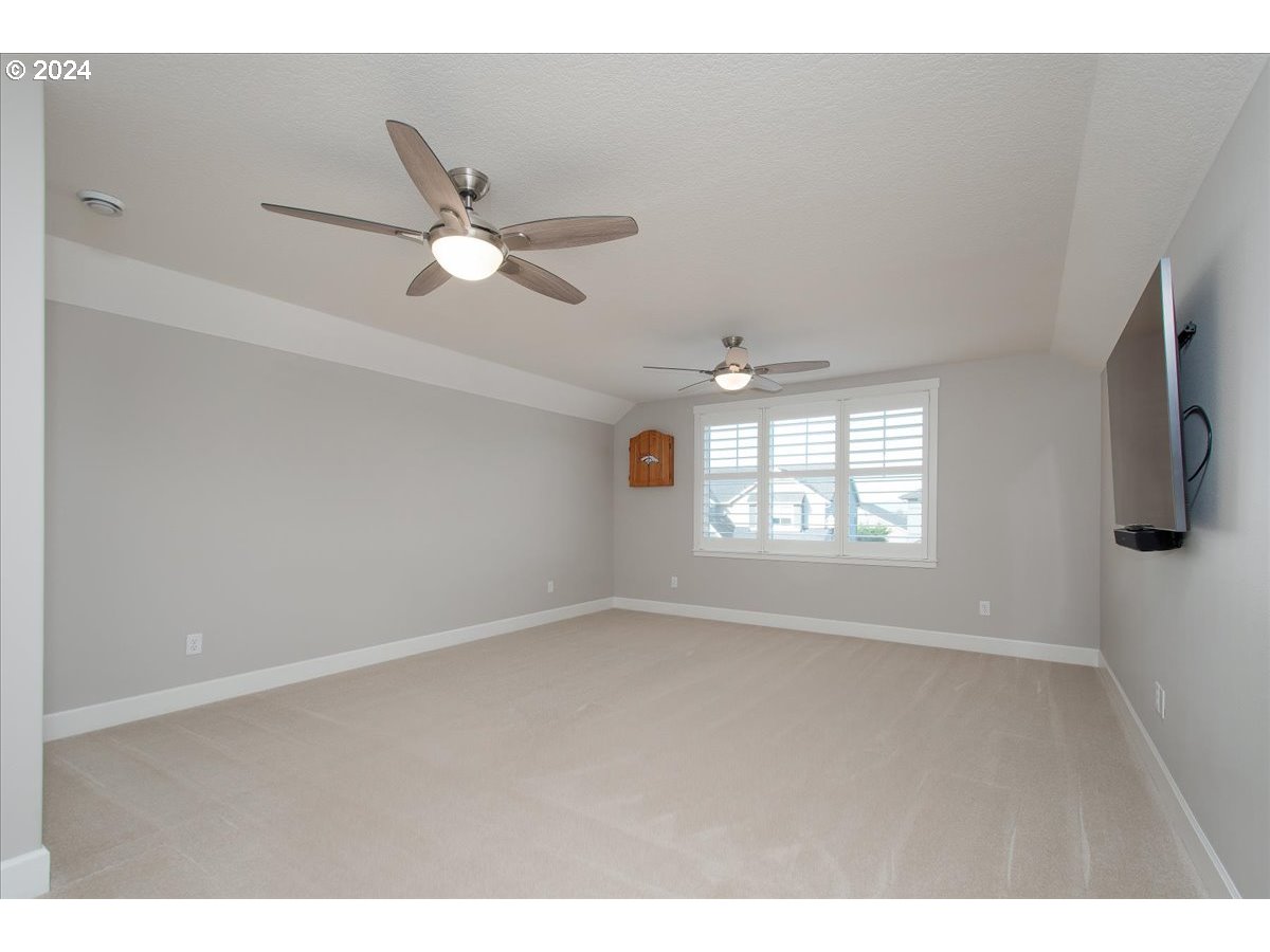 756 North 47th Avenue Ridgefield, WA 98642 - Photo 29 of 42 a view of an empty room with a window