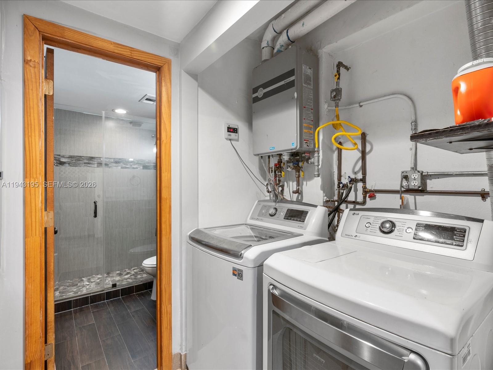 8840 Southwest 50th Terrace Miami, FL 33165 - Photo 18 of 20 a utility room with dryer and washer