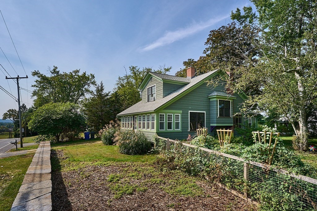 60 Florence Road Easthampton, MA 01027 - Photo 1 of 32 a house with trees in the background