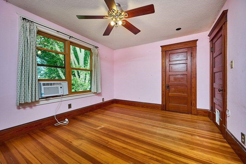 60 Florence Road Easthampton, MA 01027 - Photo 17 of 32 wooden floor in an empty room with a window