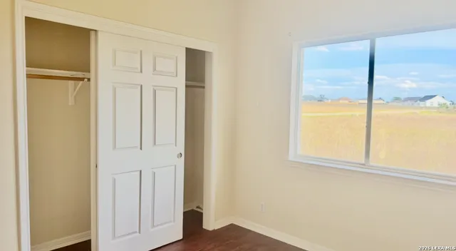an empty room with window