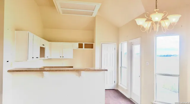 a view of kitchen with livingroom