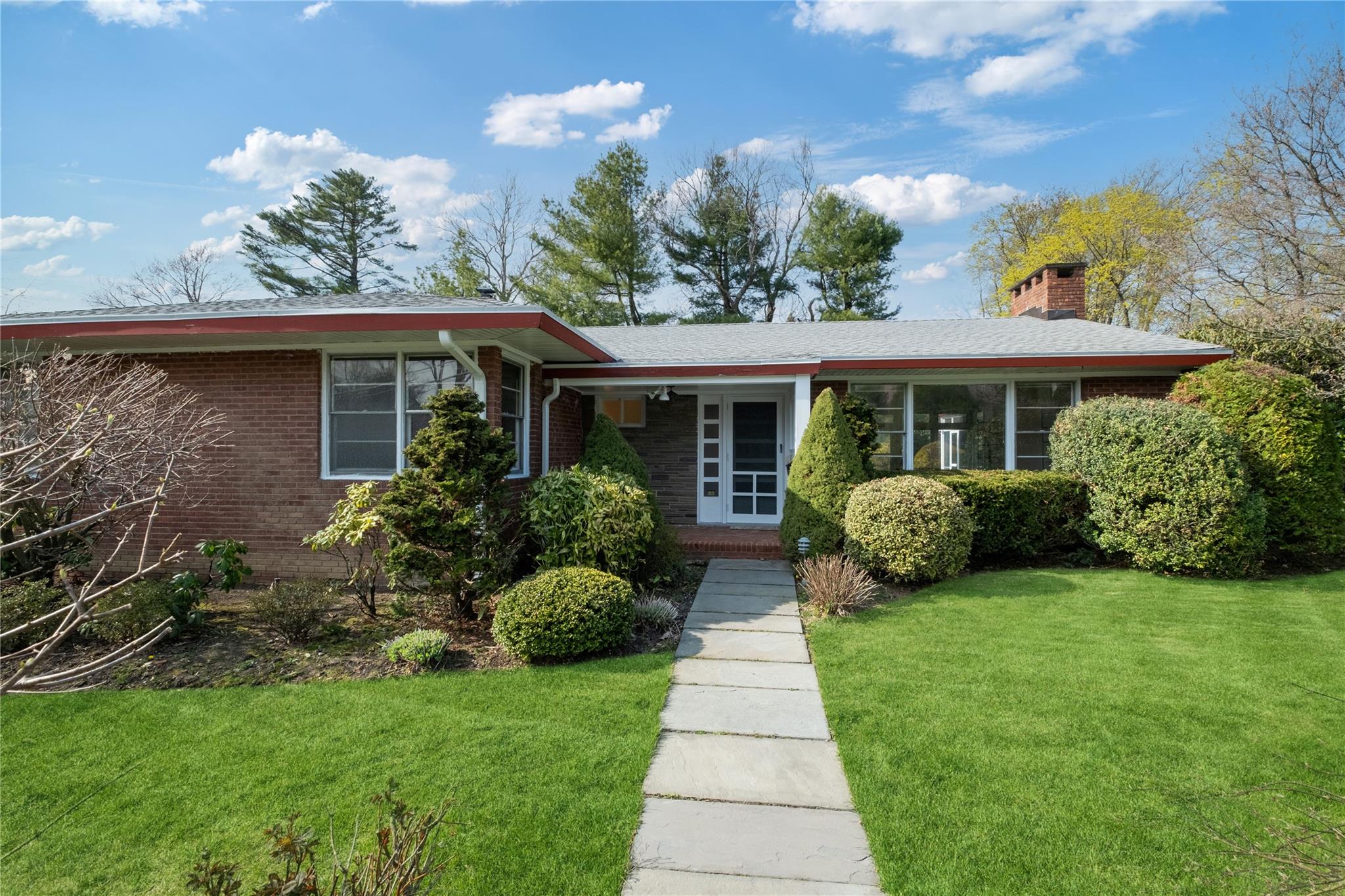 74 Carthage Road Scarsdale, NY 10583 - Photo 1 of 1 a front view of a house with a yard