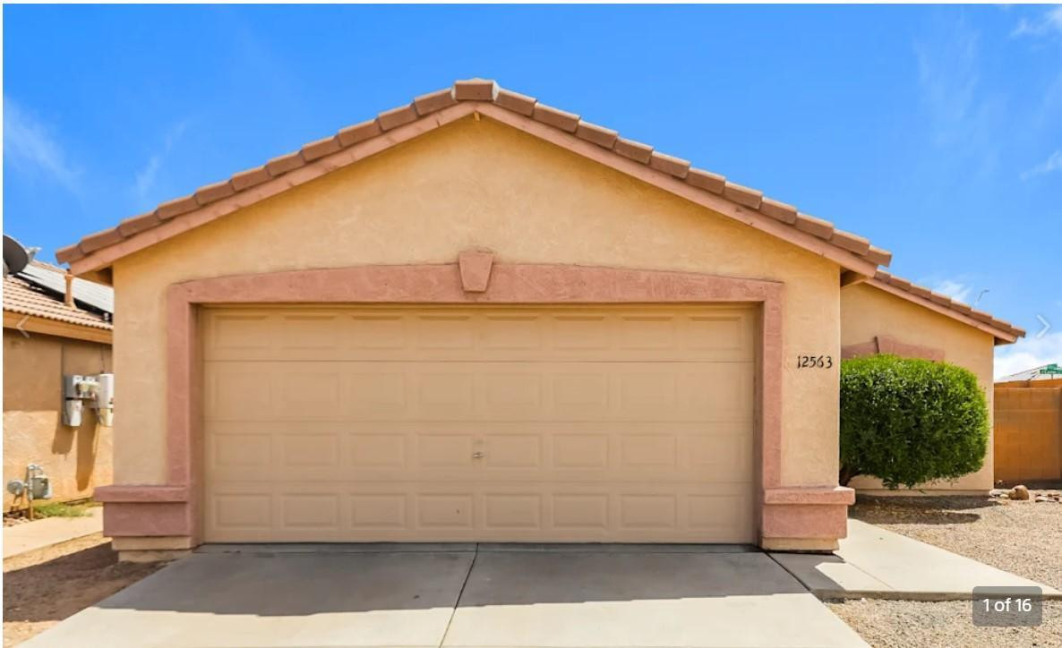 12563 West Charter Oak Road El Mirage, AZ 85335 - Photo 1 of 16 a view of a house with a garage