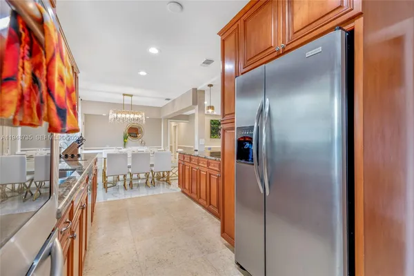 a living room with furniture a table and chairs