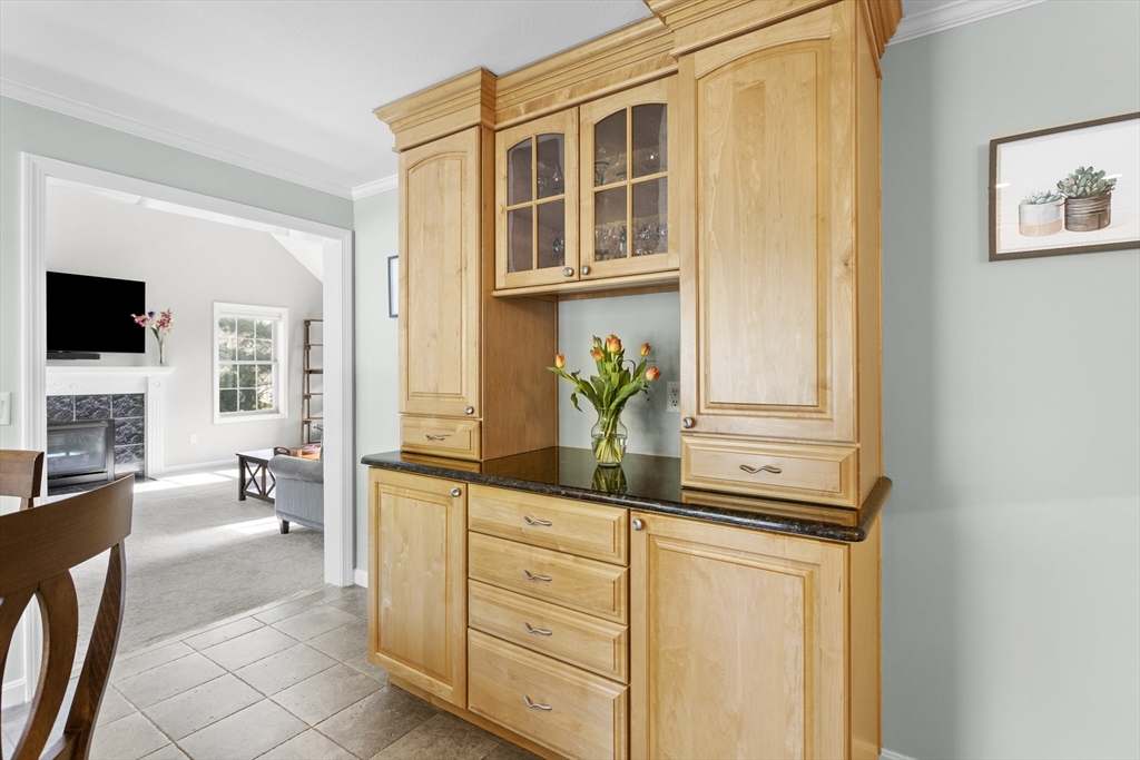 66 Clover Hill Circle Tyngsborough, MA 01879 - Photo 9 of 42 a view of living room with furniture and flat screen tv