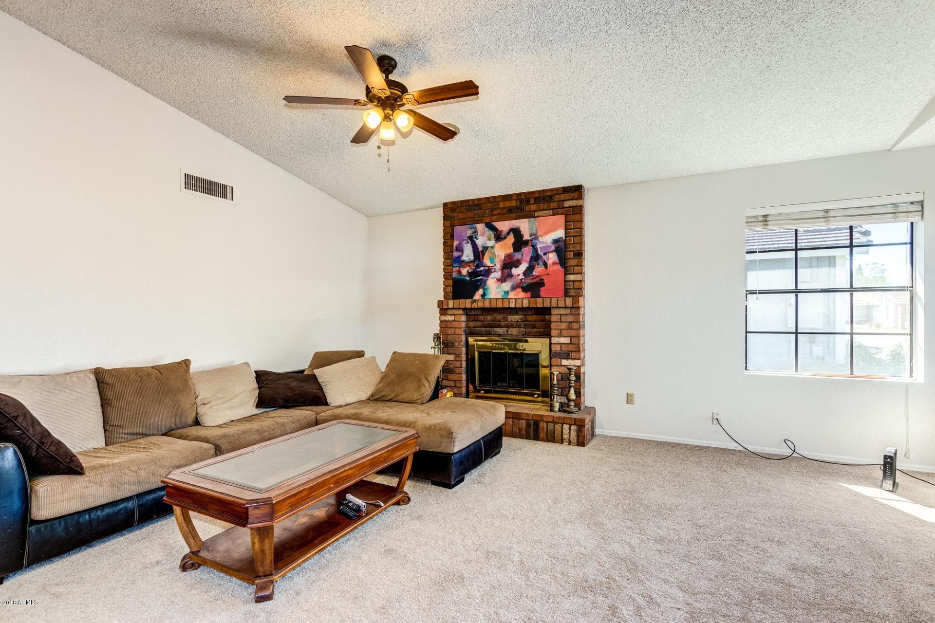 119 East Danbury Road Phoenix, AZ 85022 - Photo 2 of 18 Large Living Room with Vaulted Ceiling