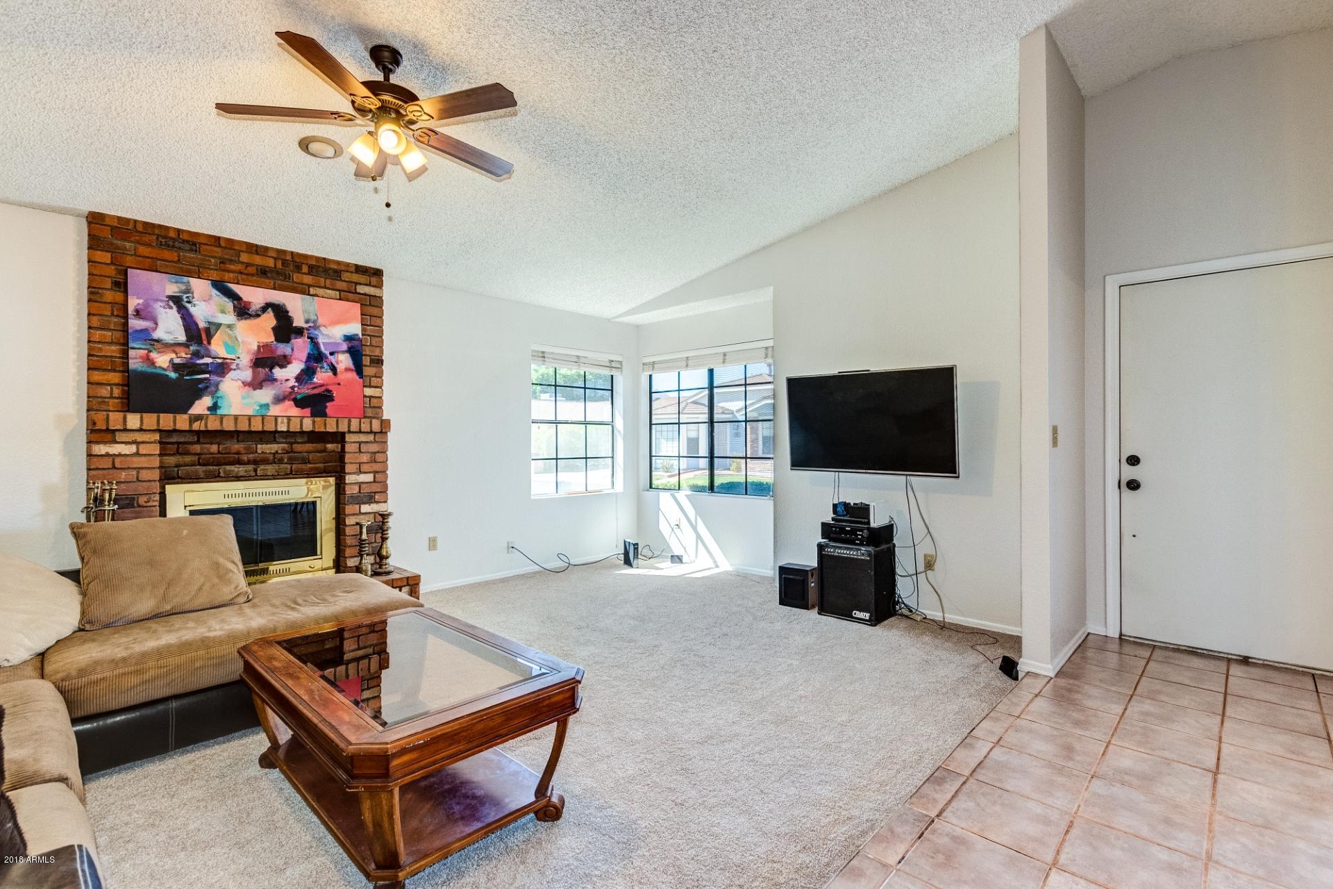 119 East Danbury Road Phoenix, AZ 85022 - Photo 4 of 18 Living Room View - Large Front Windows