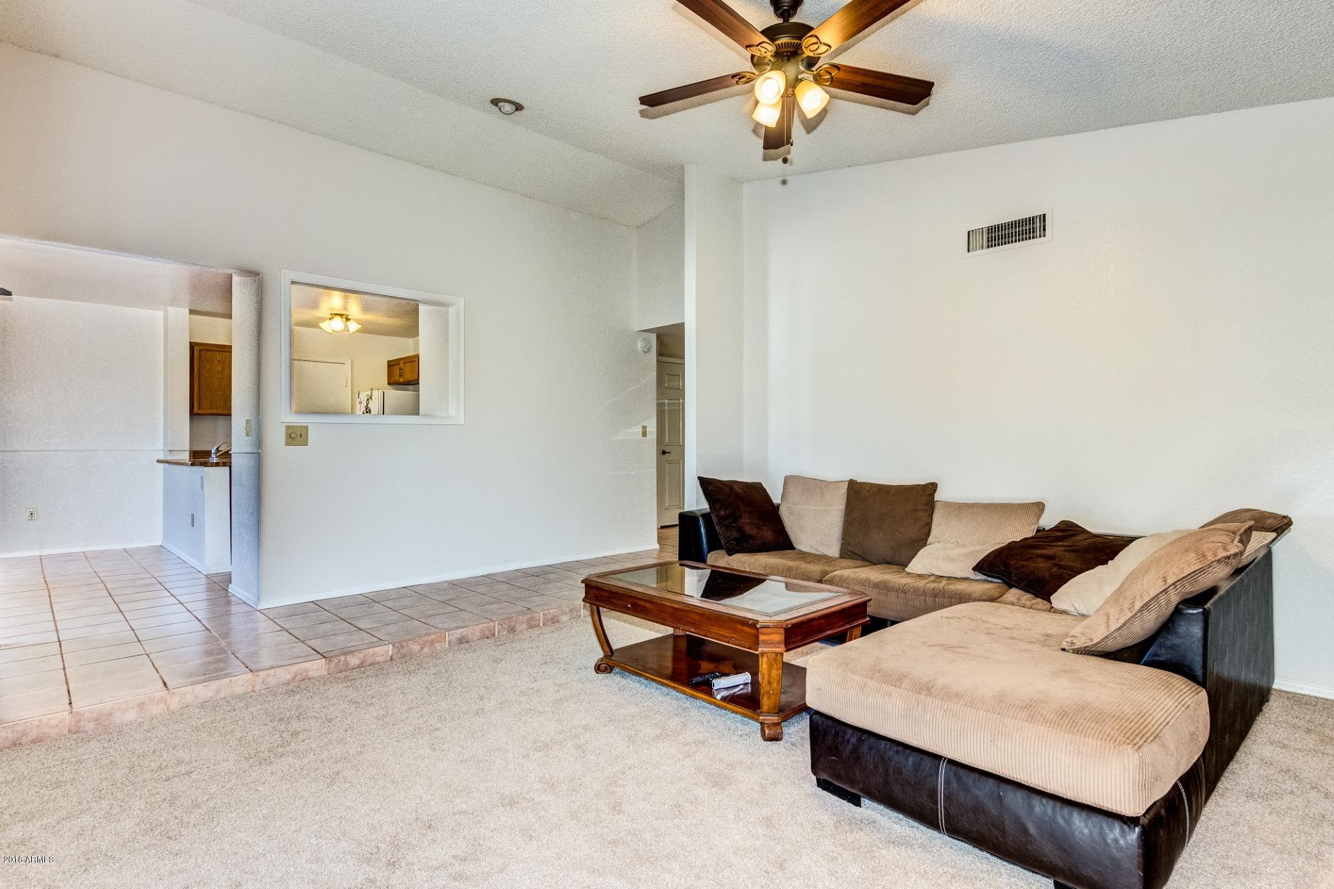 119 East Danbury Road Phoenix, AZ 85022 - Photo 5 of 18 View of Kitchen from Living Room