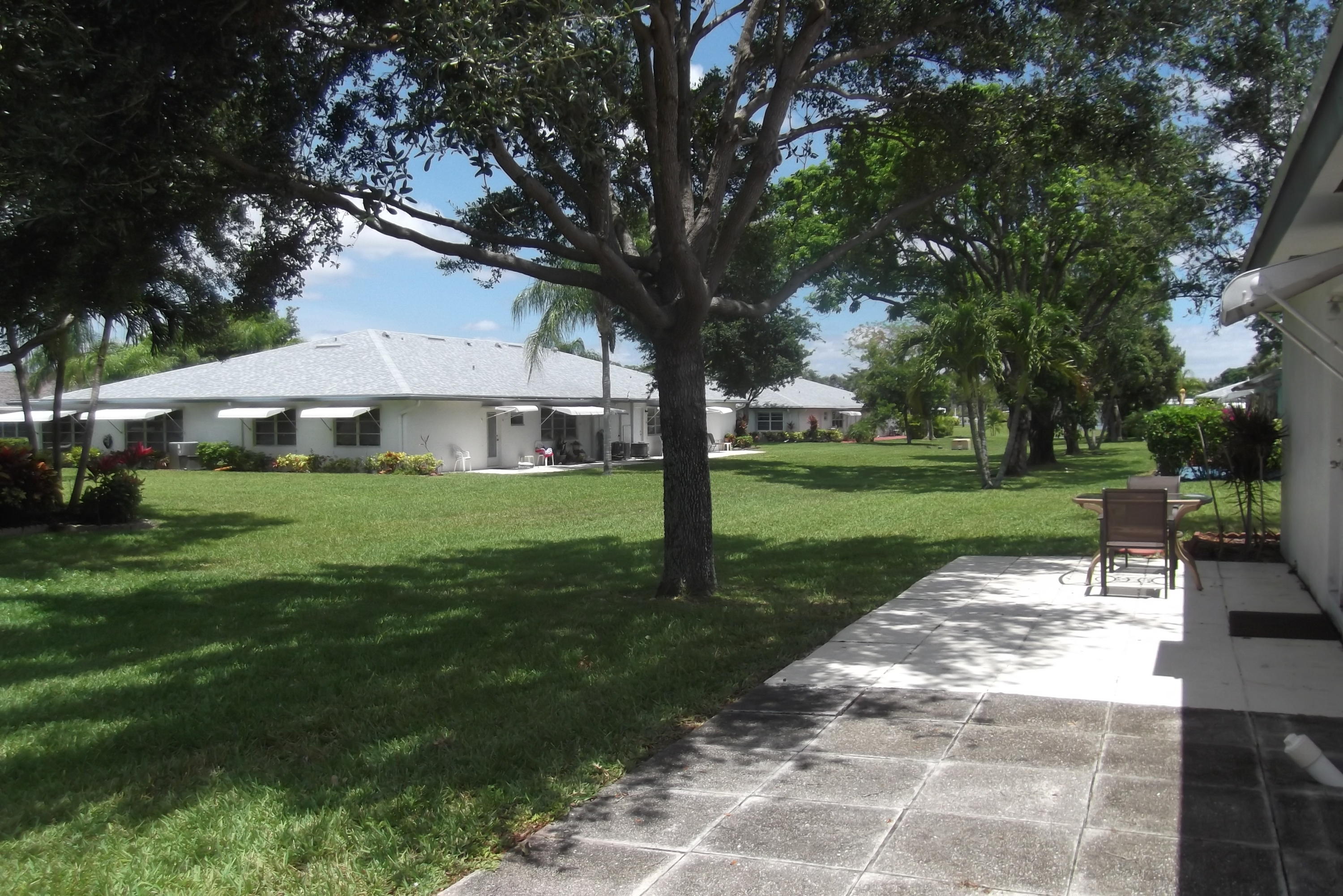 1222 South Drive Way, Unit D Delray Beach, FL 33445 - Photo 16 of 19 Rear Patio