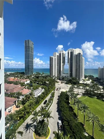 a view of a city with tall buildings